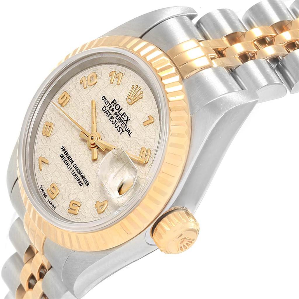 The image shows a side angle of the Rolex Datejust 69173 Women's Stainless Steel Beige Dial 69173 Women's Stainless Steel Beige Dial model, highlighting the watch face, bezel, crown, and part of the bracelet.