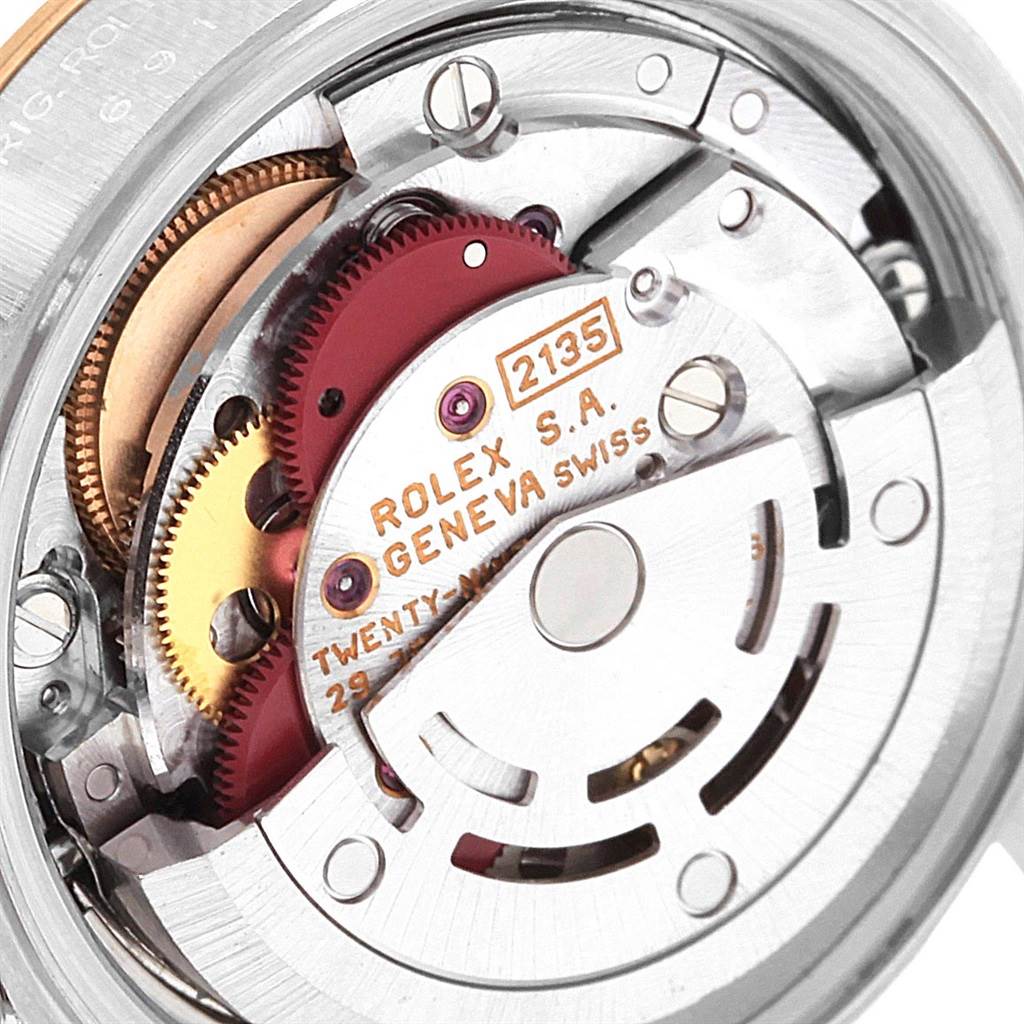 The image shows a close-up view of the movement mechanism inside a Rolex Datejust 69173 Women's Stainless Steel Beige Dial 69173 Women's Stainless Steel Beige Dial watch.