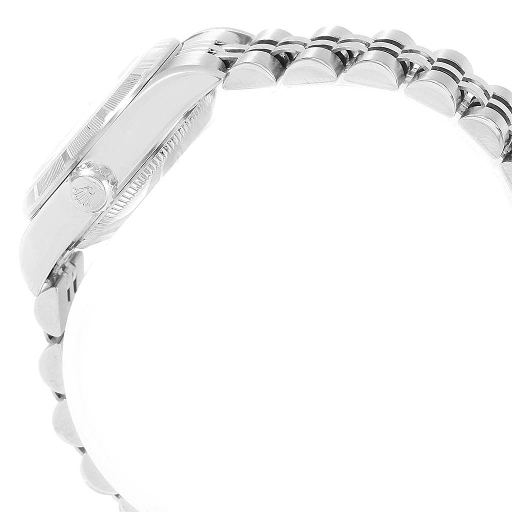 The image shows a side angle of a Rolex Datejust 79190 Women
s Stainless Steel White Dial 79190 Women
s Stainless Steel White Dial watch, focusing on the case and part of the bracelet.