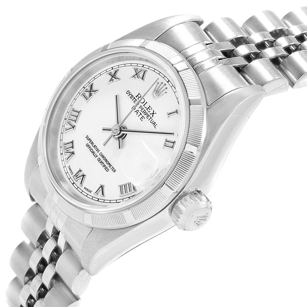 This image shows a side angle of a Rolex Datejust 79190 Women
s Stainless Steel White Dial 79190 Women
s Stainless Steel White Dial watch, highlighting the face, crown, and bracelet.