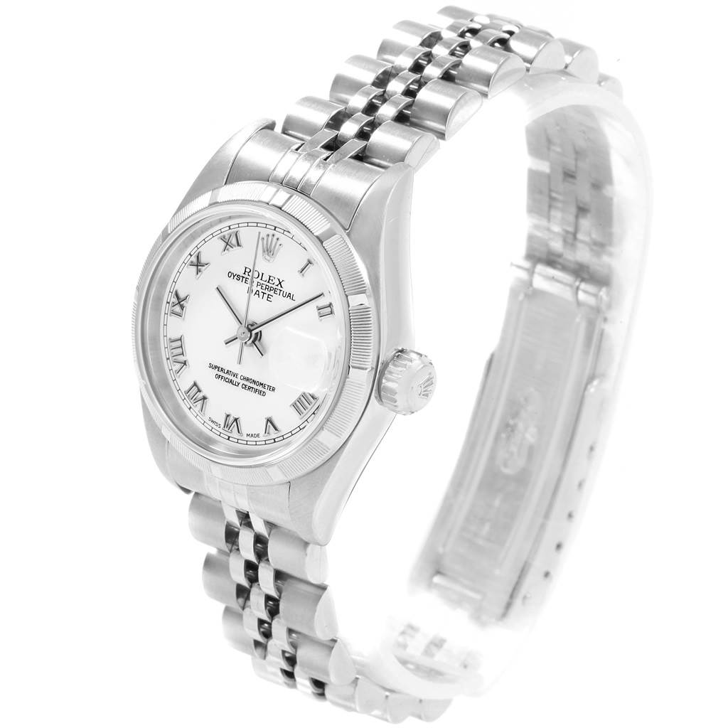 The Rolex Datejust 79190 Women
s Stainless Steel White Dial 79190 Women
s Stainless Steel White Dial watch is shown at a three-quarter angle, displaying its face, dial, bracelet, and clasp.