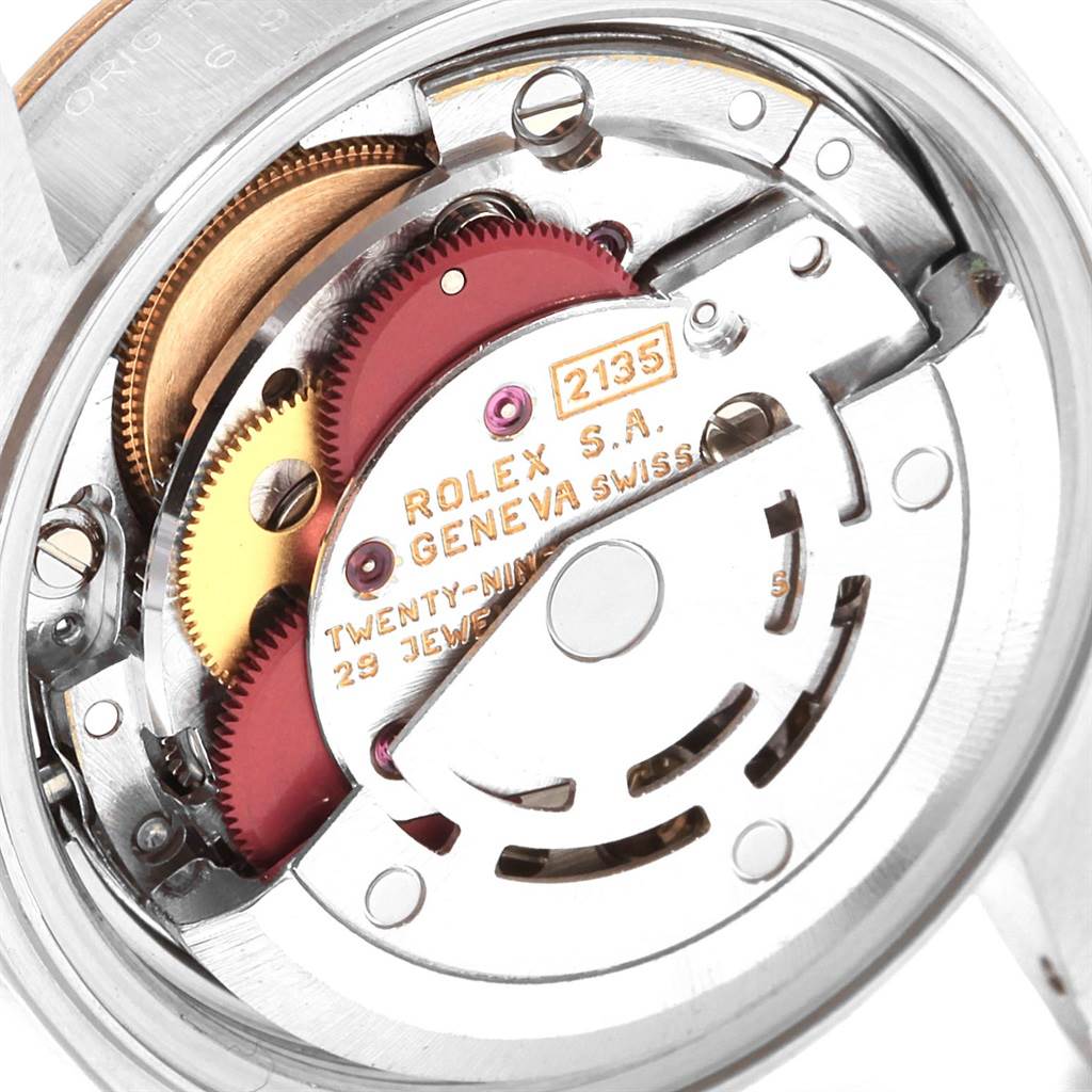 This image shows a close-up view of the movement inside a Rolex Datejust 69173 Women's Stainless Steel White Dial 69173 Women's Stainless Steel White Dial watch, highlighting its intricate mechanical parts.