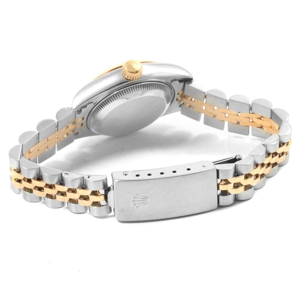 This image shows the side and back of a Rolex Datejust 69173 Women's Stainless Steel White Dial 69173 Women's Stainless Steel White Dial watch with focus on the two-tone bracelet and clasp.
