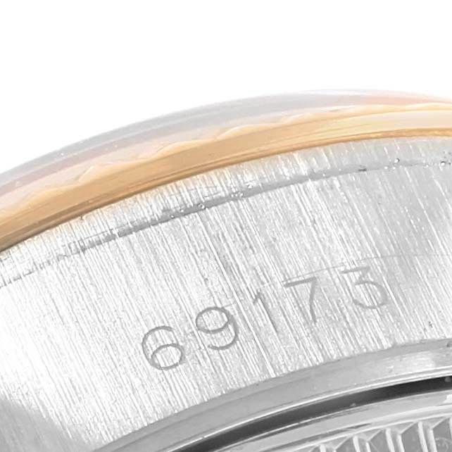 This image shows a close-up of the side of the case of a Rolex Datejust 69173 Women's Stainless Steel White Dial 69173 Women's Stainless Steel White Dial watch, highlighting the model number "69173."