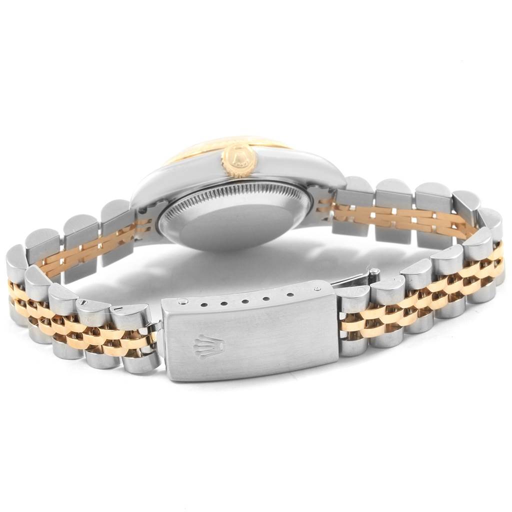 The image shows a back view of a Rolex Datejust 69173 Women's Stainless Steel Champagne Dial 69173 Women's Stainless Steel Champagne Dial watch, highlighting the case back, crown, and Jubilee bracelet with a clasp.