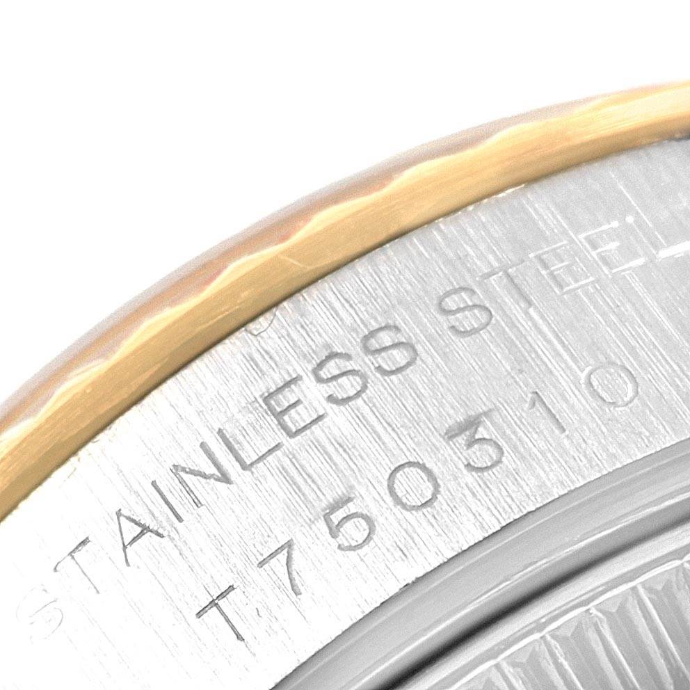 The image shows a close-up of the bezel and part of the casing of a Rolex Datejust 69173 Women's Stainless Steel Champagne Dial 69173 Women's Stainless Steel Champagne Dial watch, highlighting the "STAINLESS STEEL" engraving.