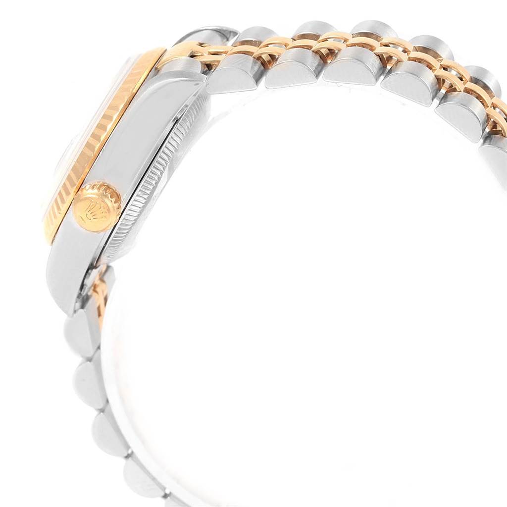 The image shows a side view of the Rolex Datejust 79173 Women's Steel and Gold (two tone) Beige Dial 79173 Women's Steel and Gold (two tone) Beige Dial watch, highlighting its crown, bezel, and bracelet.