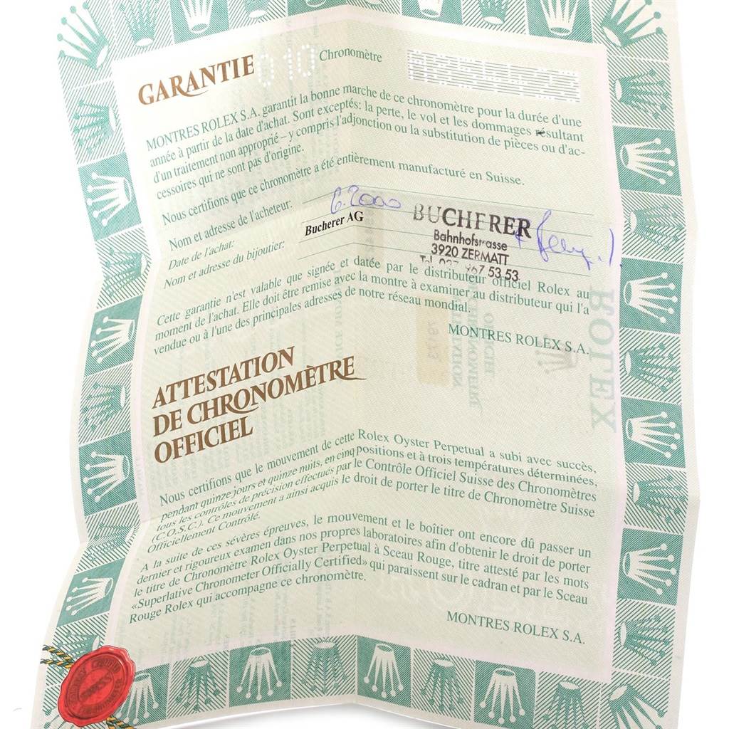 This image shows a close-up of the warranty certificate for a Rolex Datejust 79173 Women's Steel and Gold (two tone) Beige Dial 79173 Women's Steel and Gold (two tone) Beige Dial model watch.