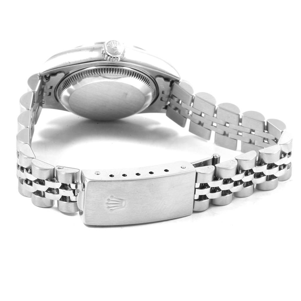 This image shows the back view of the Rolex Datejust 79190 Women's Stainless Steel Black Dial 79190 Women's Stainless Steel Black Dial watch, focusing on its case, crown, and bracelet clasp.