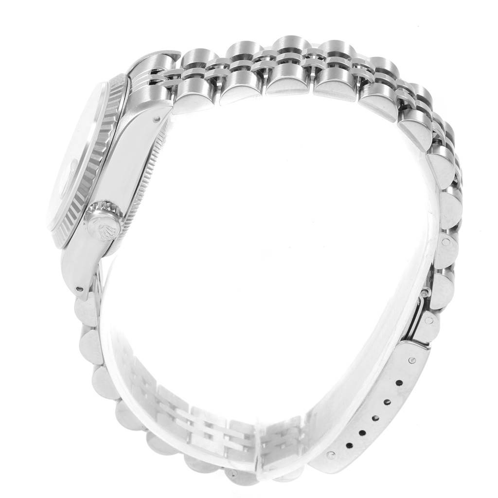 The image shows a side view of the case and bracelet of a Rolex Datejust 69174 Women's Stainless Steel Silver Dial 69174 Women's Stainless Steel Silver Dial watch, highlighting its crown and clasp.