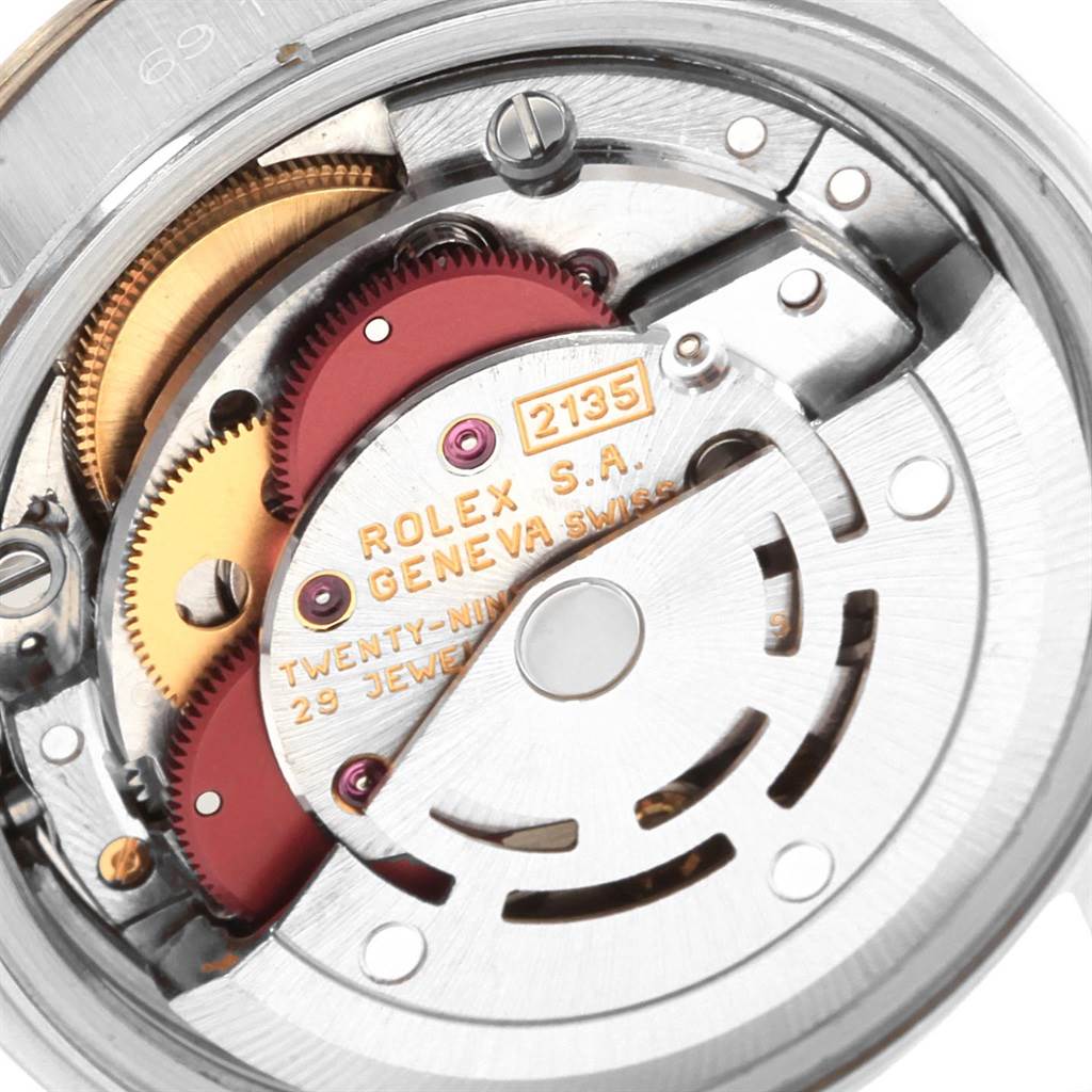 This close-up image shows the movement mechanism inside a Rolex Datejust 69174 Women's Stainless Steel Silver Dial 69174 Women's Stainless Steel Silver Dial watch.