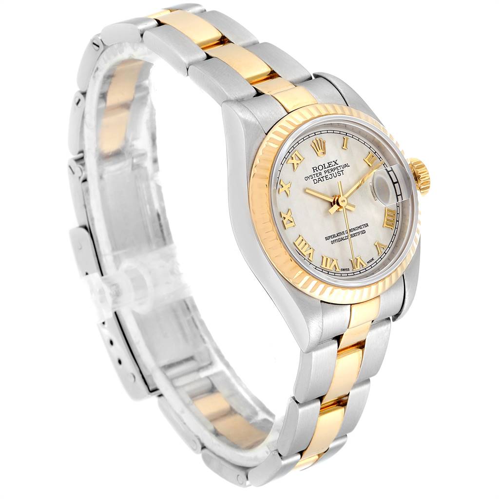 The image shows a Rolex Datejust 79173 Women's Steel and Gold (two tone) Beige Dial 79173 Women's Steel and Gold (two tone) Beige Dial watch at an oblique angle, highlighting its two-tone metal bracelet, fluted bezel, and dial.