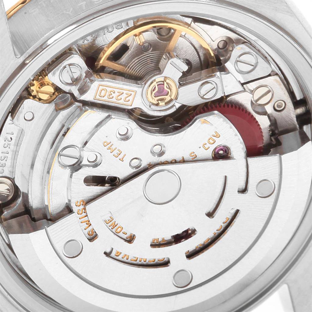 This image shows a close-up view of the Rolex Datejust 79173 Women's Steel and Gold (two tone) Beige Dial 79173 Women's Steel and Gold (two tone) Beige Dial model's movement mechanism from the back.