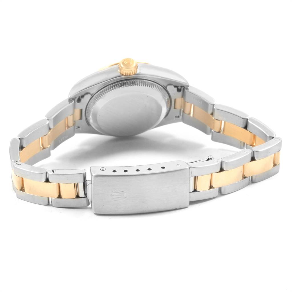 This image shows the backside of the Rolex Datejust 79173 Women's Steel and Gold (two tone) Beige Dial 79173 Women's Steel and Gold (two tone) Beige Dial watch, highlighting the clasp, case back, and bracelet.