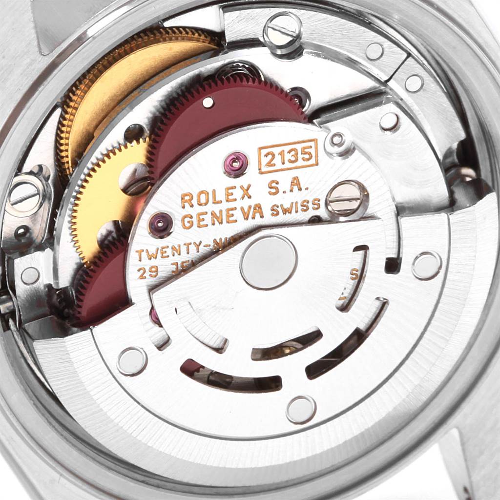 The image shows a close-up of the Rolex Datejust 69173 Women's Stainless Steel Grey Dial 69173 Women's Stainless Steel Grey Dial watch's movement mechanism from the back.