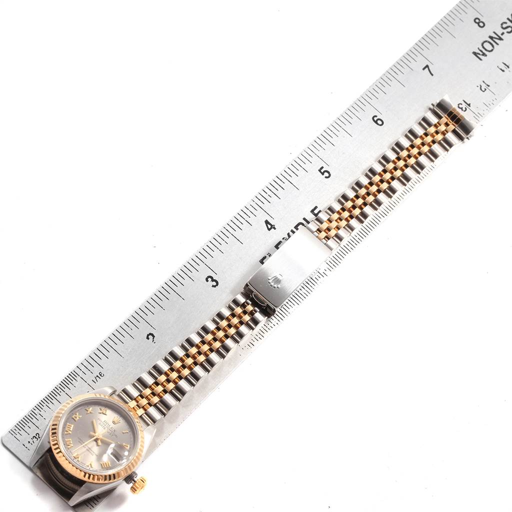 The image shows a Rolex Datejust 69173 Women's Stainless Steel Grey Dial 69173 Women's Stainless Steel Grey Dial watch laying flat with visible face, bezel, and Jubilee bracelet alongside a measuring ruler.