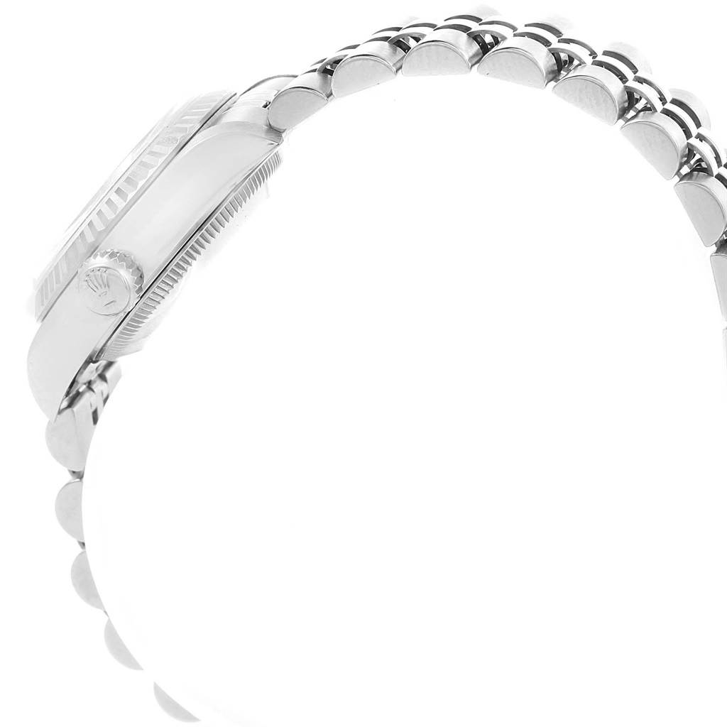 This image shows a side view of the Rolex Datejust 69174 Women's Stainless Steel Silver Dial 69174 Women's Stainless Steel Silver Dial watch, highlighting the case, bezel, and part of the bracelet.