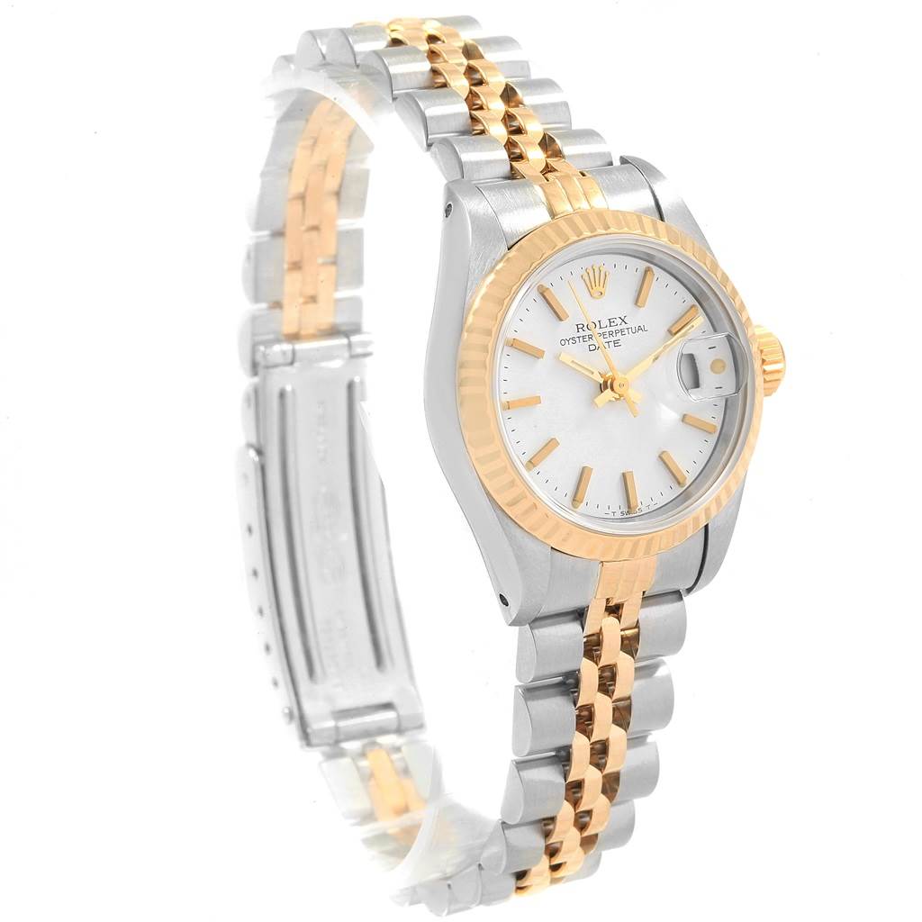 This image shows a Rolex Datejust 69173 Women's Stainless Steel White Dial 69173 Women's Stainless Steel White Dial watch at a three-quarter angle, highlighting its silver dial, two-tone bracelet, and fluted bezel.