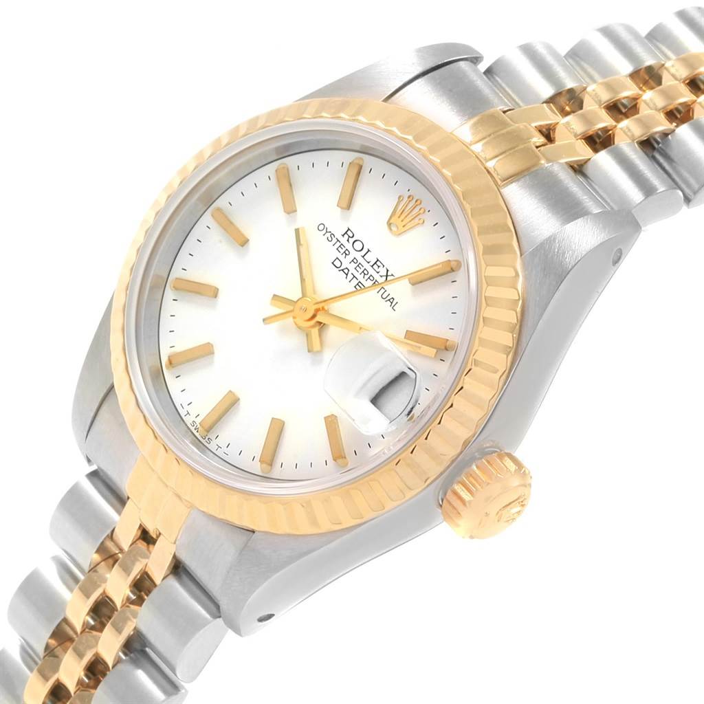The Rolex Datejust 69173 Women's Stainless Steel White Dial 69173 Women's Stainless Steel White Dial watch is shown at an angled close-up, featuring the face, crown, bezel, and part of the strap.