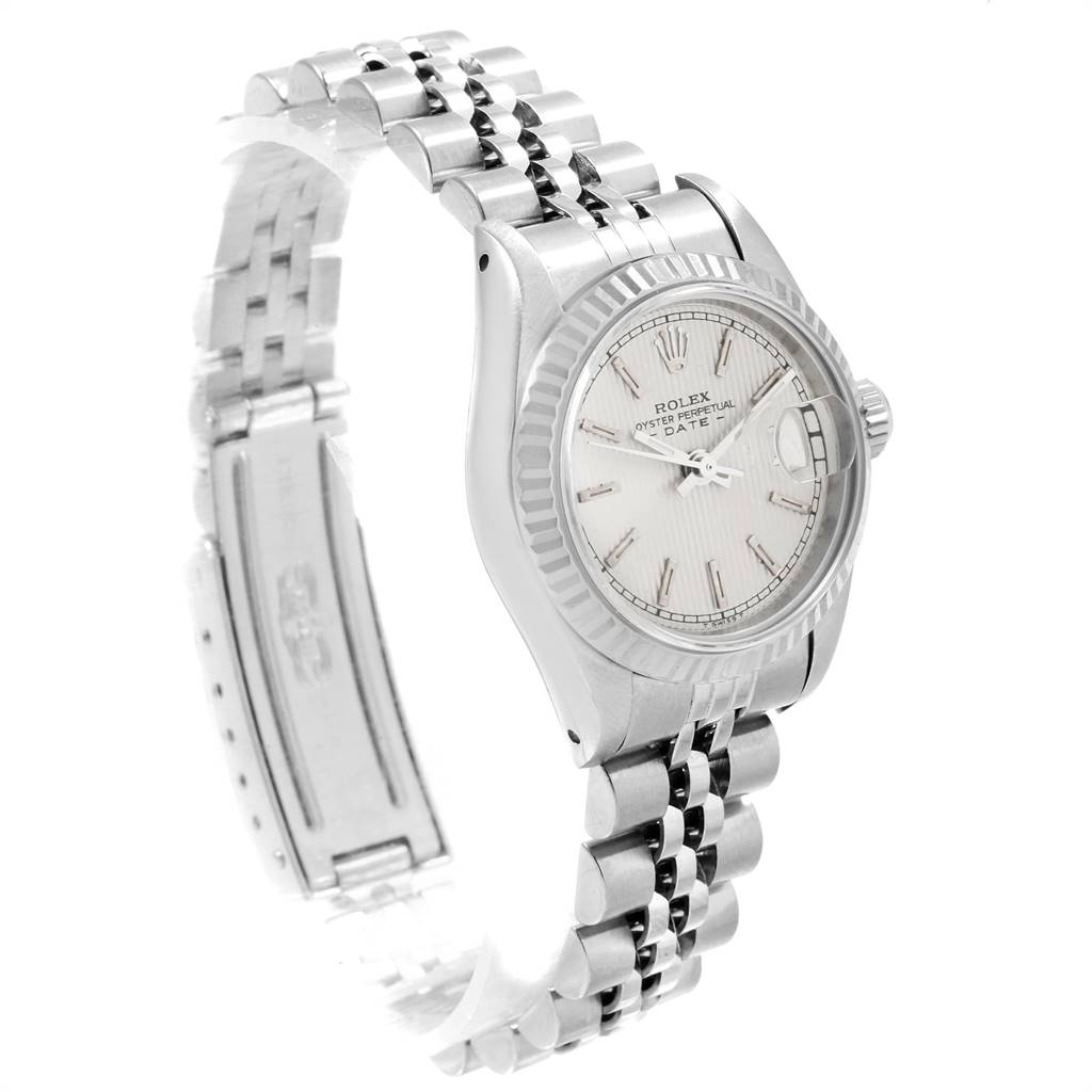 This image shows a side view of a Rolex Datejust 69174 Women's Stainless Steel Silver Dial 69174 Women's Stainless Steel Silver Dial watch, highlighting its bracelet, clasp, and face with the date window.
