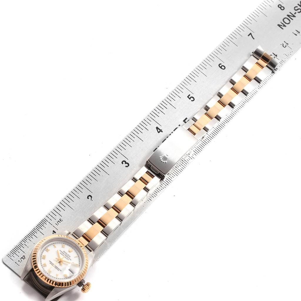 The image shows a laid-flat side view of a Rolex Datejust 69173 Women's Stainless Steel White Dial 69173 Women's Stainless Steel White Dial watch model, measured against a ruler.