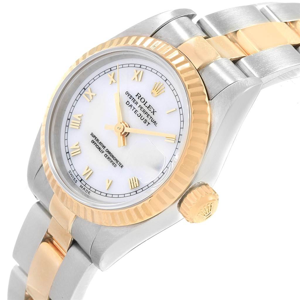 The image shows a close-up of the Rolex Datejust 69173 Women's Stainless Steel White Dial 69173 Women's Stainless Steel White Dial watch from an oblique angle, highlighting the dial, bezel, crown, and part of the bracelet.