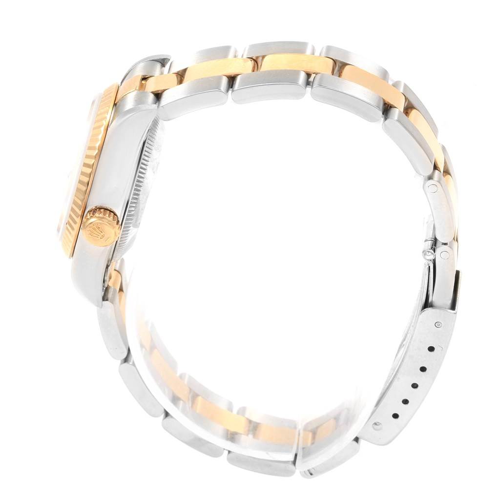 This image shows the side profile and bracelet of a Rolex Datejust 69173 Women's Stainless Steel White Dial 69173 Women's Stainless Steel White Dial watch, highlighting the crown and two-tone metal finish.