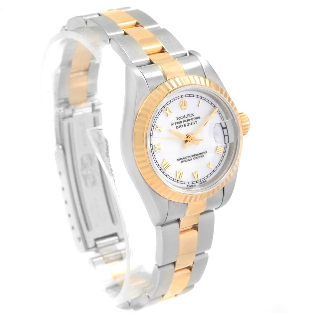 The image shows a Rolex Datejust 69173 Women's Stainless Steel White Dial 69173 Women's Stainless Steel White Dial watch at an angle highlighting the face, bezel, and two-tone metal bracelet.