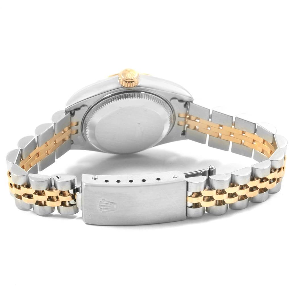 The image shows the back case and clasp of a Rolex Datejust 79173 Women's Steel and Gold (two tone) Champagne Dial 79173 Women's Steel and Gold (two tone) Champagne Dial watch, displaying its two-tone bracelet.