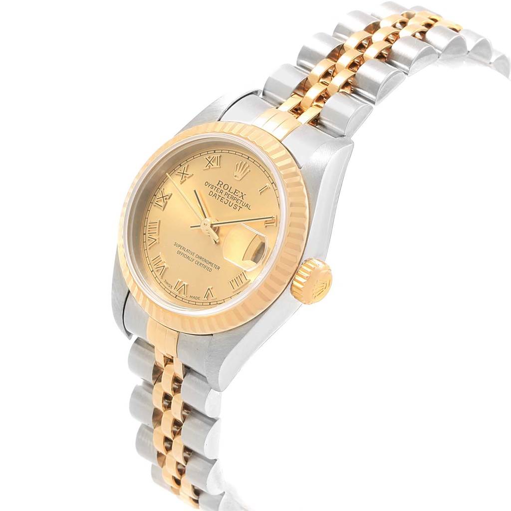 The image shows a tilted angle of the Rolex Datejust 79173 Women's Steel and Gold (two tone) Champagne Dial 79173 Women's Steel and Gold (two tone) Champagne Dial watch, highlighting the dial, bezel, crown, and two-tone bracelet.
