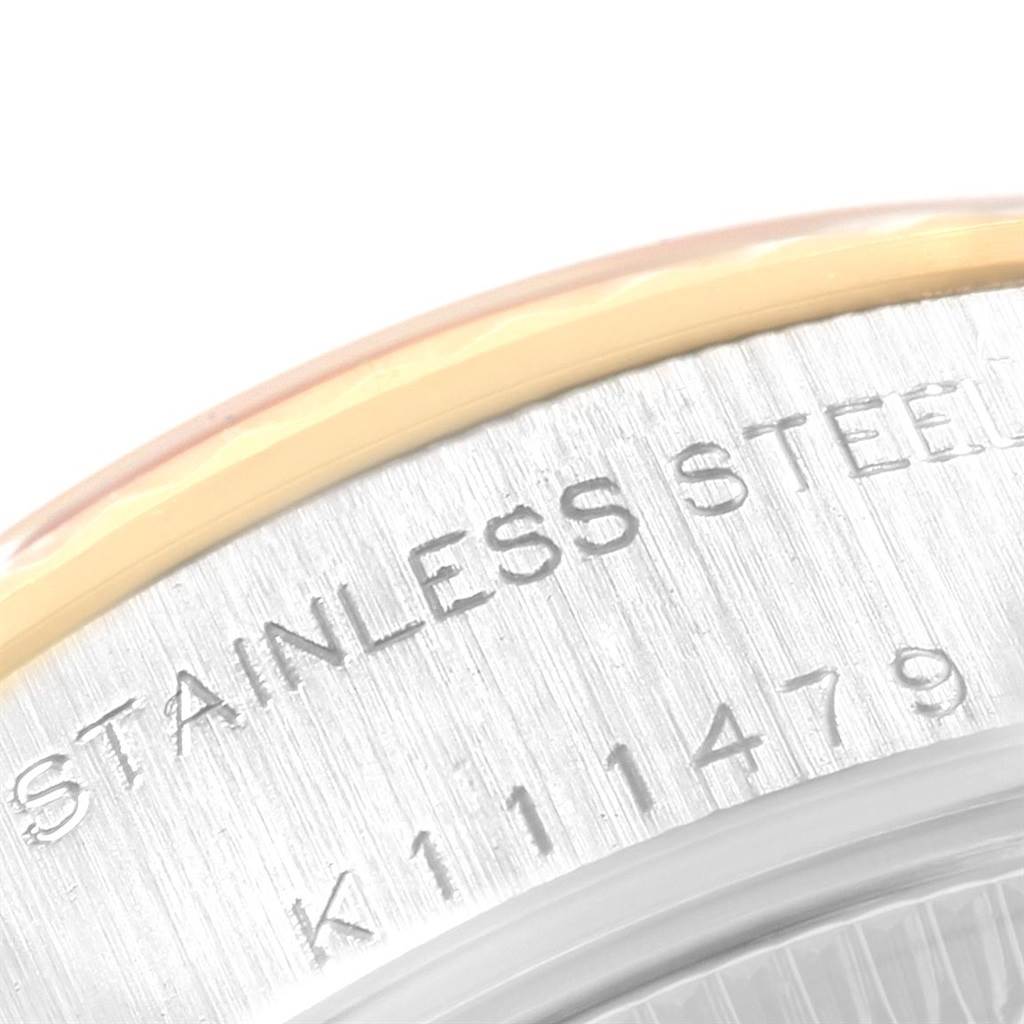 The image shows a close-up of the stainless steel case back of a Rolex Datejust 79173 Women's Steel and Gold (two tone) Champagne Dial 79173 Women's Steel and Gold (two tone) Champagne Dial watch, displaying the model and serial number.