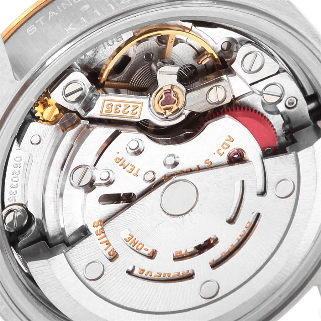 This is a close-up view of the Rolex Datejust 79173 Women's Steel and Gold (two tone) Champagne Dial 79173 Women's Steel and Gold (two tone) Champagne Dial movement, showing intricate internal components.