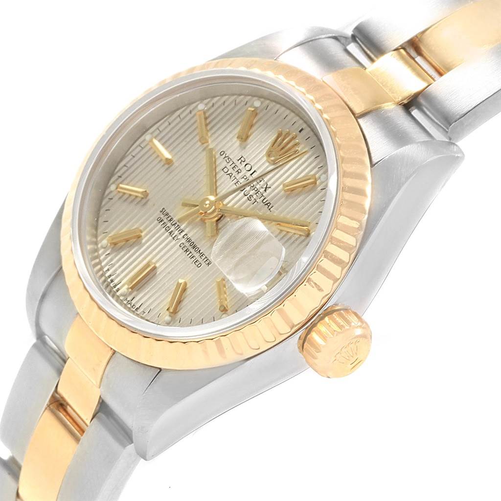 The image shows a close-up view of the Rolex Datejust 79173 Women's Steel and Gold (two tone) Silver Dial 79173 Women's Steel and Gold (two tone) Silver Dial watch, highlighting the face, bezel, crown, and part of the bracelet.