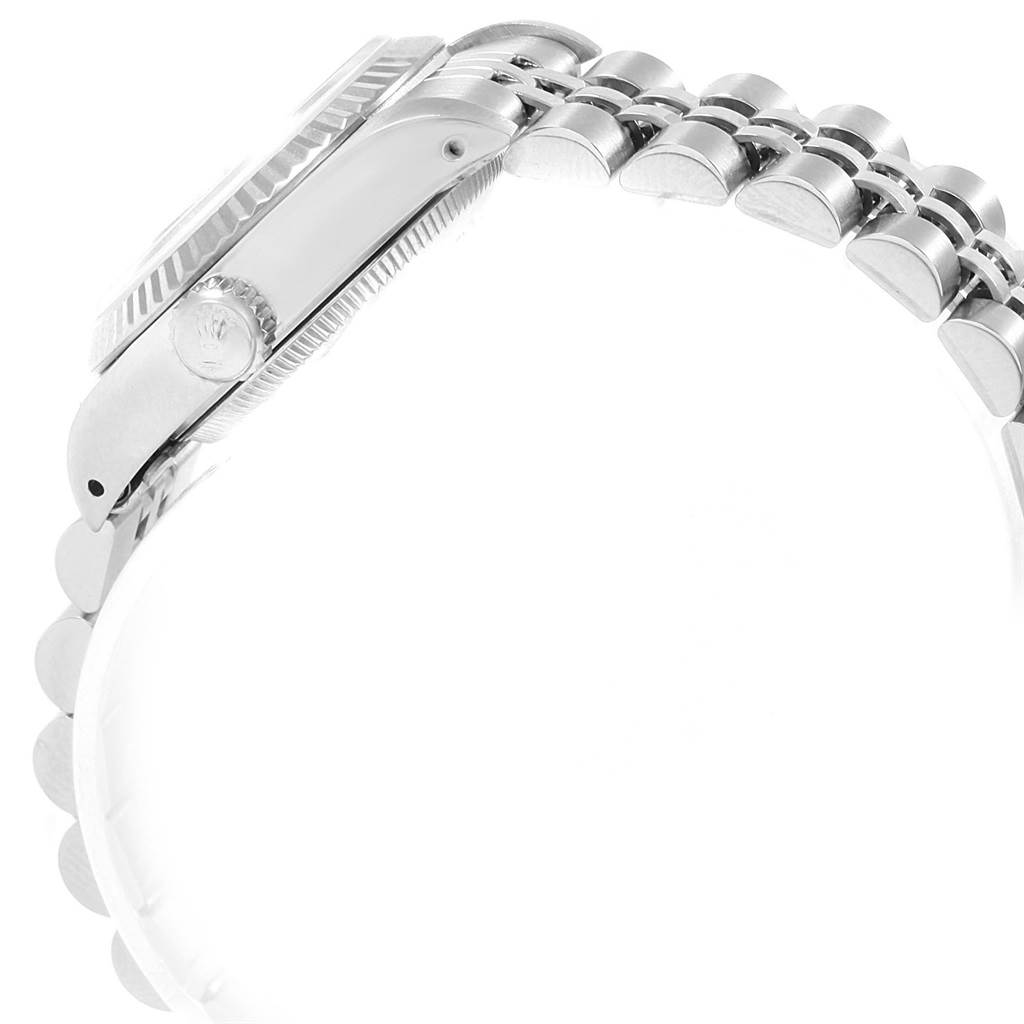 The image shows a side view of the Rolex Datejust 69174 Women's Stainless Steel Silver Dial 69174 Women's Stainless Steel Silver Dial model, highlighting the crown, case, bezel, and part of the bracelet.