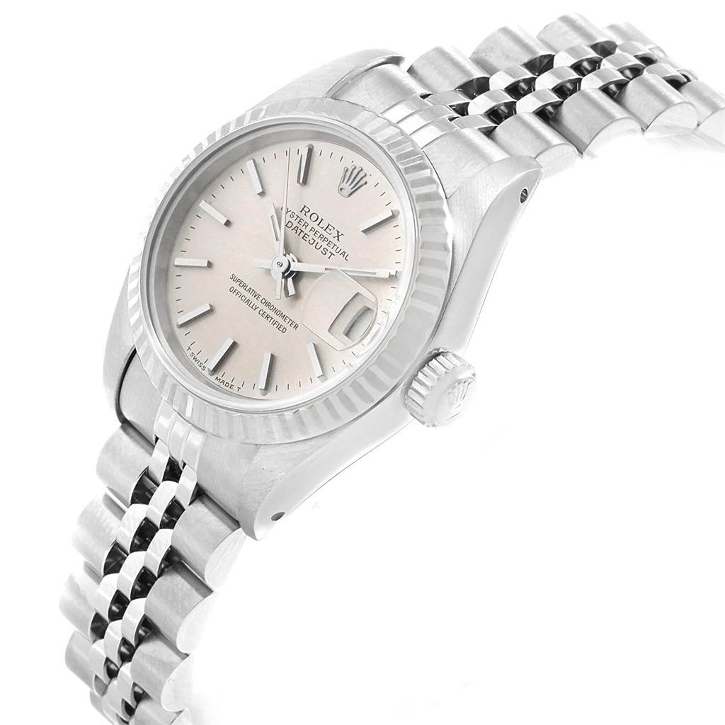 The Rolex Datejust 69174 Women's Stainless Steel Silver Dial 69174 Women's Stainless Steel Silver Dial watch is shown at an angle highlighting its face, fluted bezel, crown, and stainless steel bracelet.