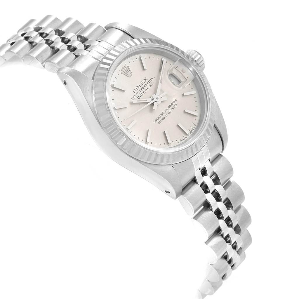 The image shows a side angle of the Rolex Datejust 69174 Women's Stainless Steel Silver Dial 69174 Women's Stainless Steel Silver Dial watch highlighting the dial, bezel, case, and part of the bracelet.