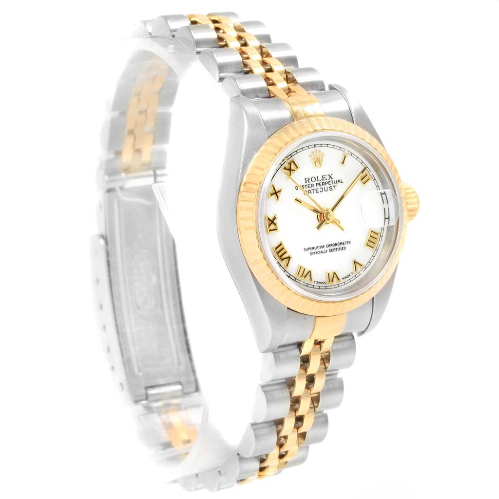 This image shows a Rolex Datejust 19784 Women's Stainless Steel White Dial 19784 Women's Stainless Steel White Dial watch at a three-quarter angle, highlighting its face, bezel, and two-tone bracelet.