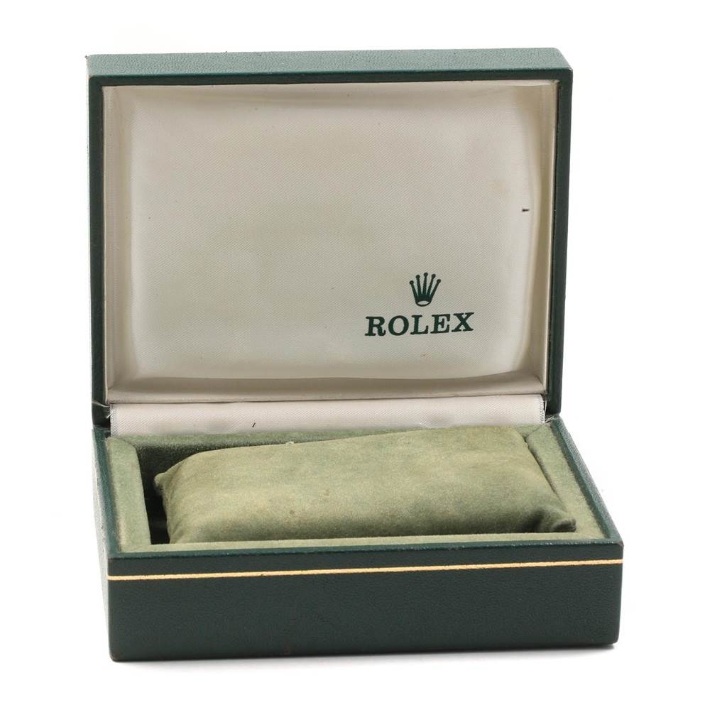 The image shows an open Rolex watch box for the Datejust model, featuring the interior pillow and the Rolex logo.