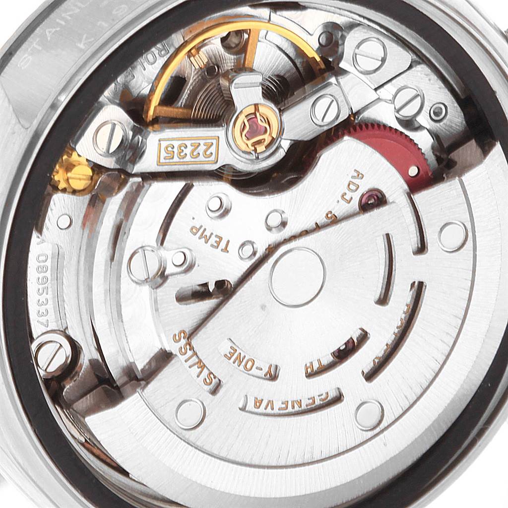 This image shows a close-up view of the movement of a Rolex Datejust 79174 Women
s Stainless Steel Pink Dial 79174 Women
s Stainless Steel Pink Dial watch, highlighting the intricate inner components.