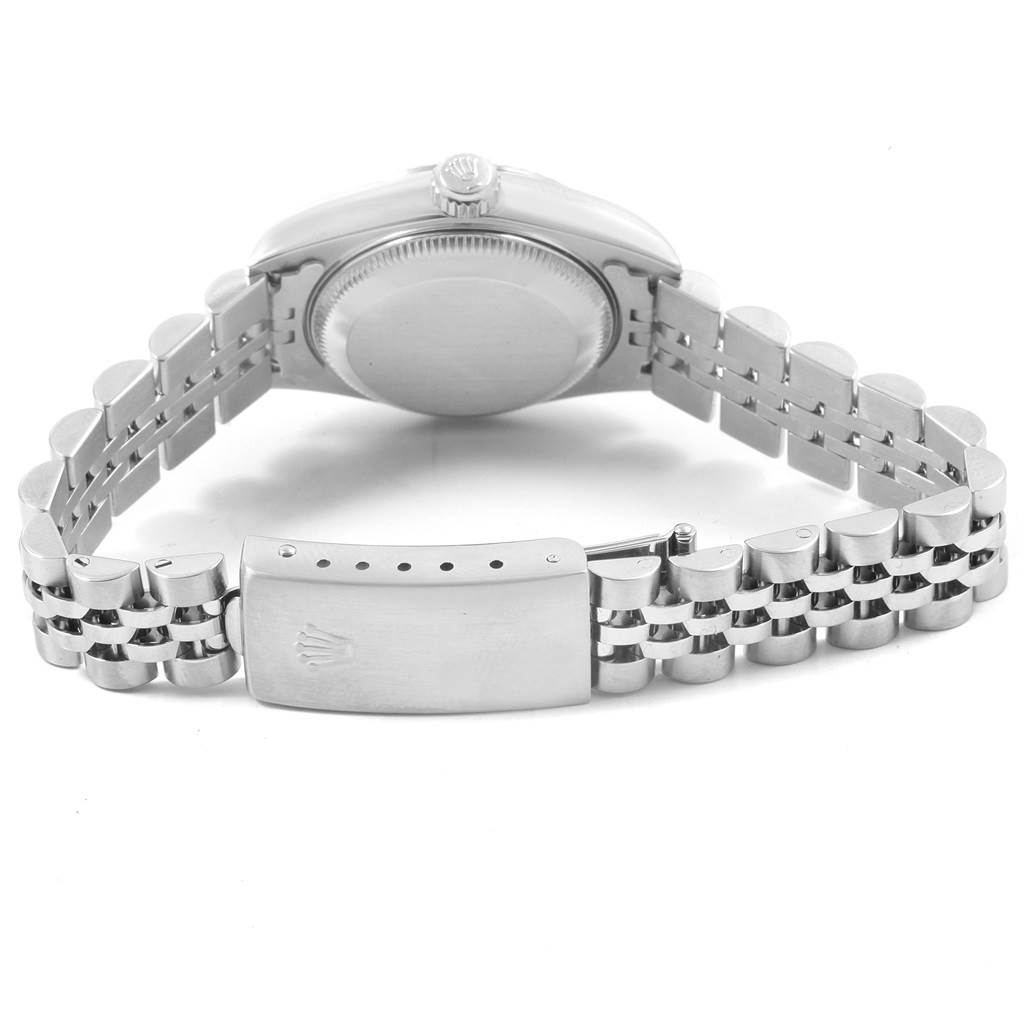 This image shows the back and clasp of a Rolex Datejust 79174 Women
s Stainless Steel Pink Dial 79174 Women
s Stainless Steel Pink Dial watch viewed from a low angle.