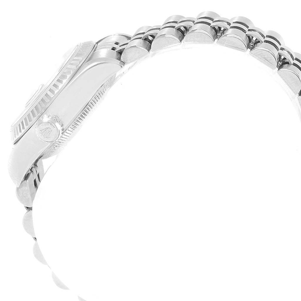 The image shows a side view of a Rolex Datejust 79174 Women
s Stainless Steel Pink Dial 79174 Women
s Stainless Steel Pink Dial watch displaying the crown, case side, and part of the bracelet.