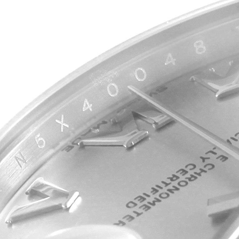 This close-up image of the Rolex Datejust 178274 Women's Stainless Steel Silver Dial 178274 Women's Stainless Steel Silver Dial watch shows the detailed dial, indices, and a portion of the bezel.