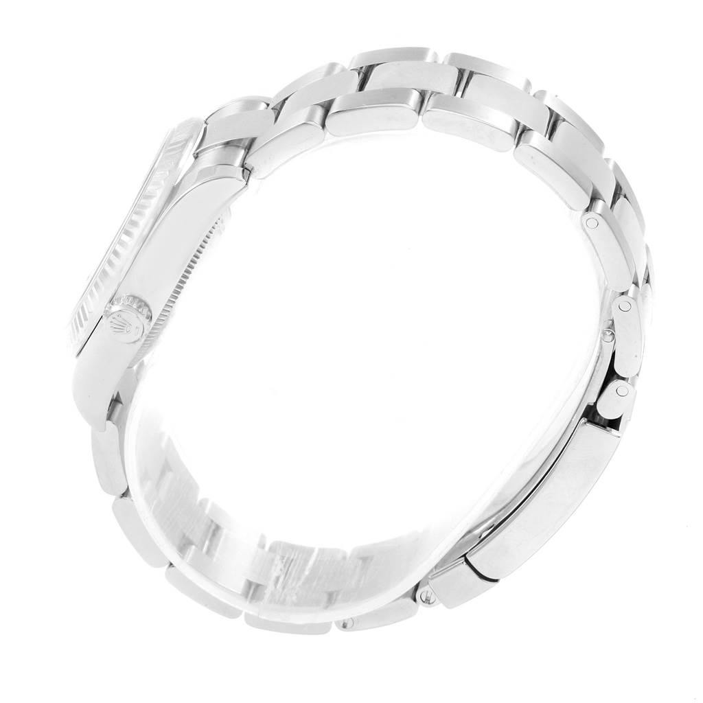 This image shows a side view of a Rolex Datejust 178274 Women's Stainless Steel Silver Dial 178274 Women's Stainless Steel Silver Dial watch, highlighting the crown, case, and bracelet.