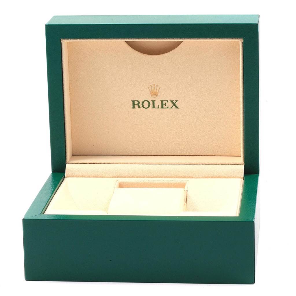The image shows an open green Rolex Datejust 178274 Women's Stainless Steel Silver Dial 178274 Women's Stainless Steel Silver Dial watch box, displaying the brand's logo inside.