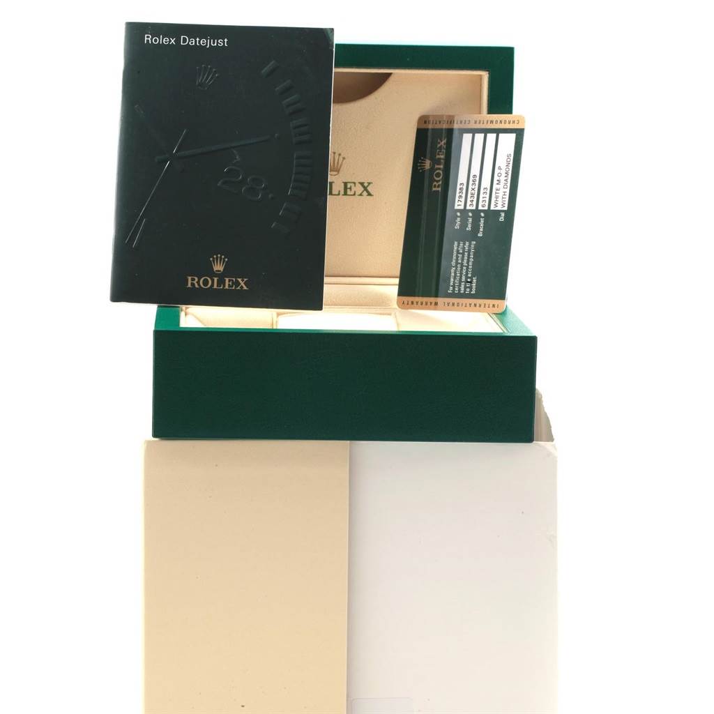 The image shows the accessories for a Rolex Datejust 179383 Women's Steel and Gold (two tone) Mother of Pearl Dial 179383 Women's Steel and Gold (two tone) Mother of Pearl Dial watch, including the box, manual, and warranty card.