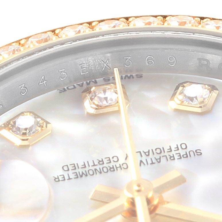 This close-up image of the Rolex Datejust 179383 Women's Steel and Gold (two tone) Mother of Pearl Dial 179383 Women's Steel and Gold (two tone) Mother of Pearl Dial watch shows the dial with diamond markers and partial view of the bezel.