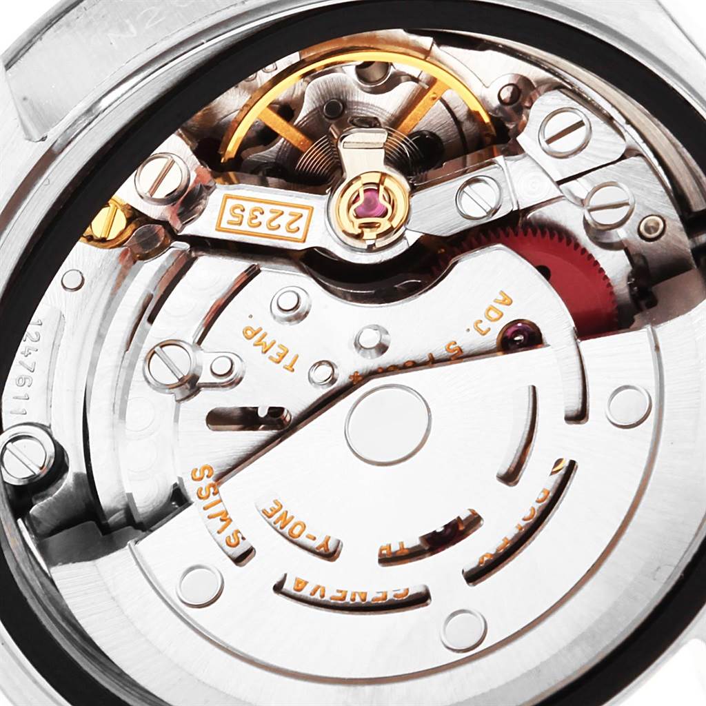 The image shows an up-close view of the Rolex Datejust 69174 Women's Stainless Steel Silver Dial 69174 Women's Stainless Steel Silver Dial watch's internal movement mechanism from the back.