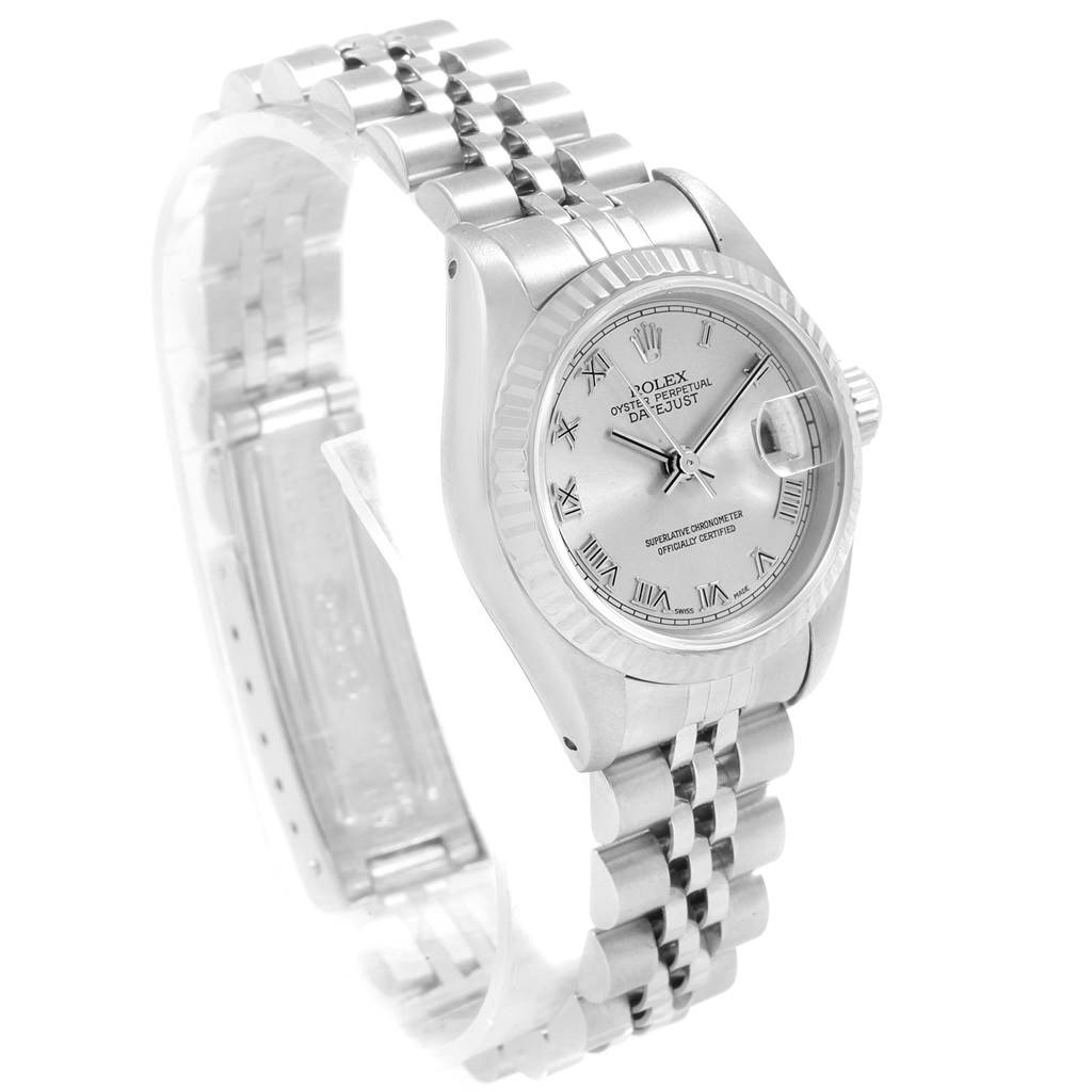 This image shows a Rolex Datejust 69174 Women's Stainless Steel Silver Dial 69174 Women's Stainless Steel Silver Dial watch from a three-quarter angle, displaying the face, bezel, and Jubilee bracelet.