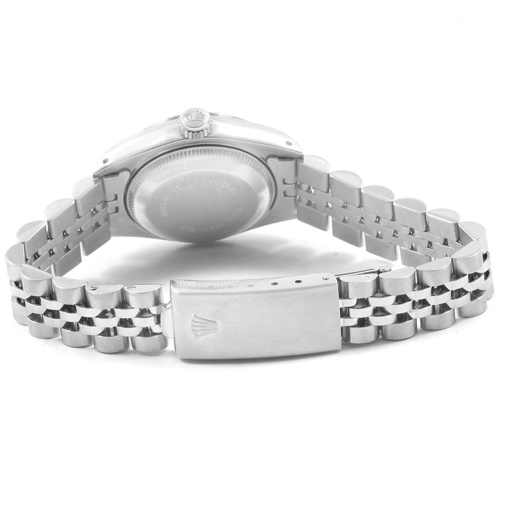 This is the back view of a Rolex Datejust 69174 Women's Stainless Steel Silver Dial 69174 Women's Stainless Steel Silver Dial watch, showing the case back, crown, and partially extended Jubilee bracelet.