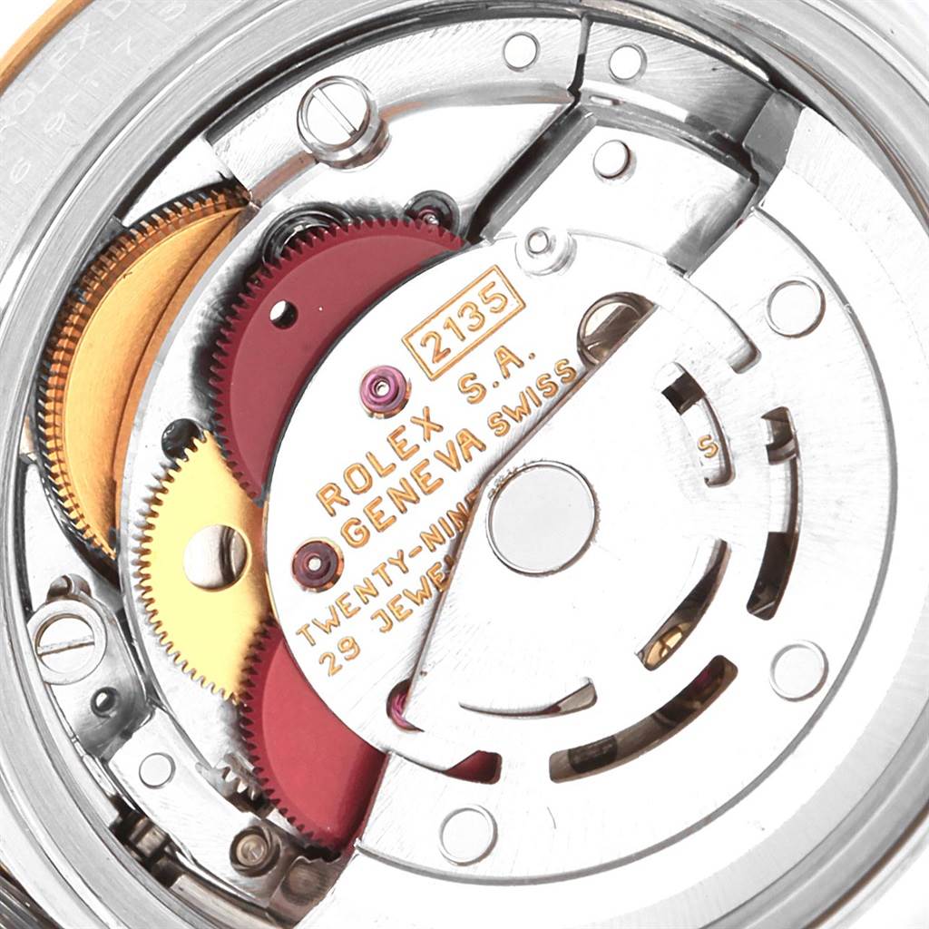 This image shows the internal movement mechanism of a Rolex Datejust 69173 Women's Stainless Steel White Dial 69173 Women's Stainless Steel White Dial watch at close-up.